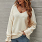 V-Necked Sweater with cuff details
