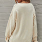 V-Necked Sweater with cuff details